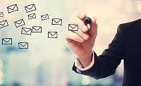 Businessman drawing E-mails concept